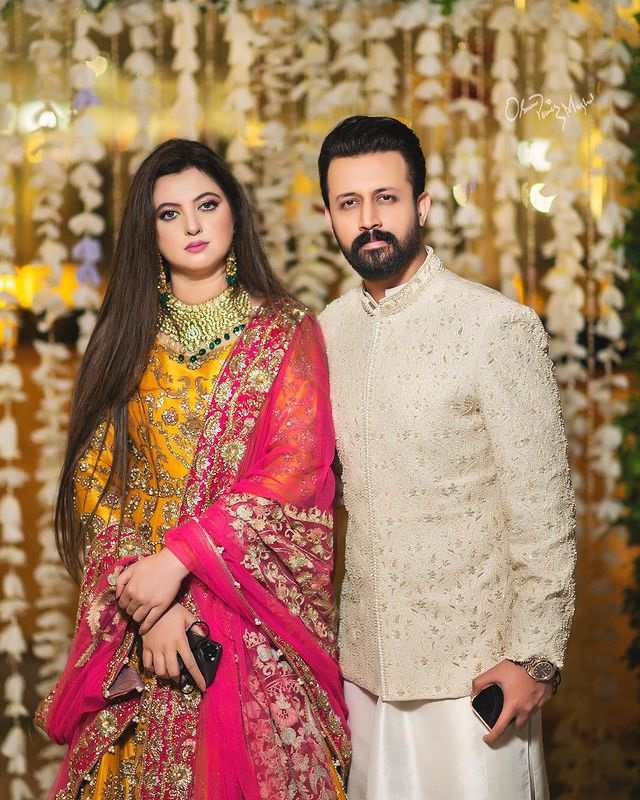 Atif Aslam With His Wife At Recent Family Wedding