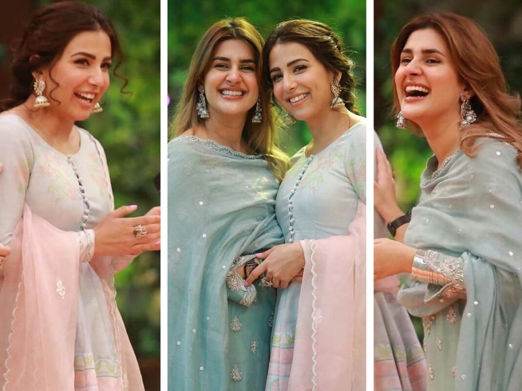 Ushna Shah holding Kubra Khan in her arms like a baby