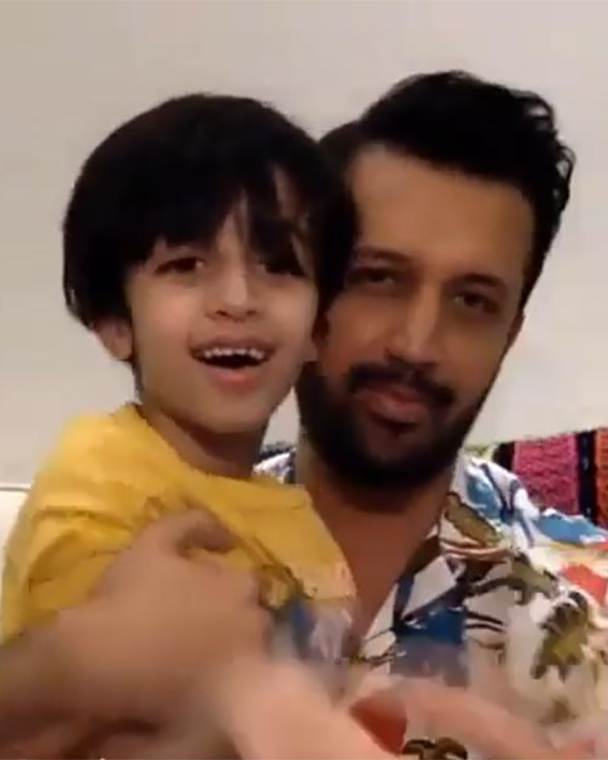 Atif Aslam’s son Ahad gives his very first performance on stage with father, recites Tajdar e Haram